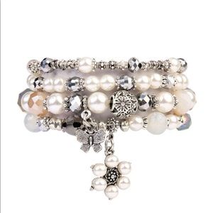 Butterfly multi bead stretch charm bracelet